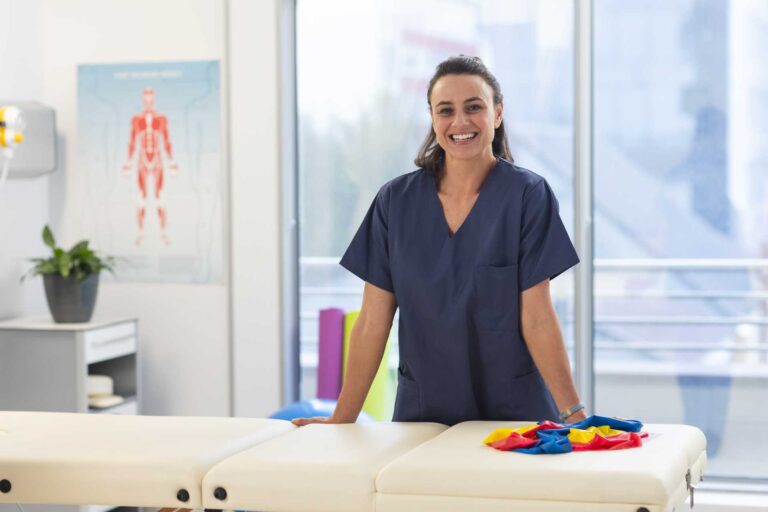 Portrait of a smiling female osteopath at a osteopathy clinic