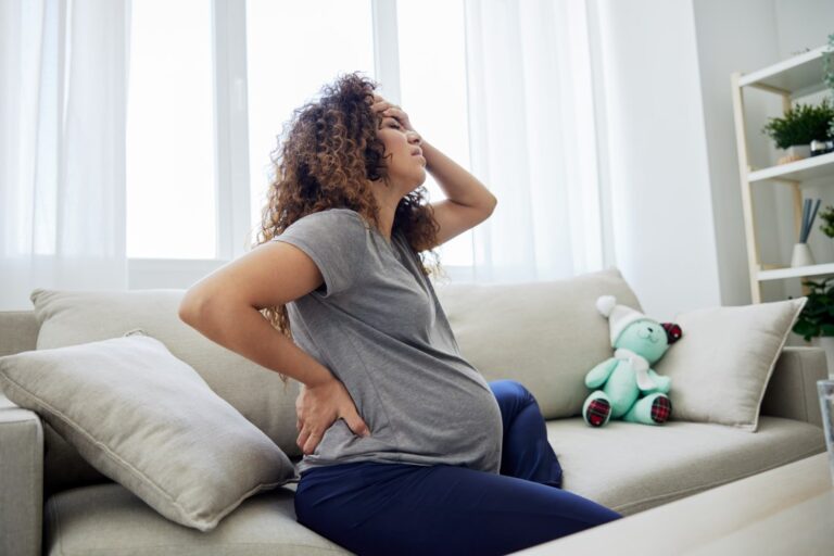Pregnant woman in pain, pain and discomfort during pregnancy